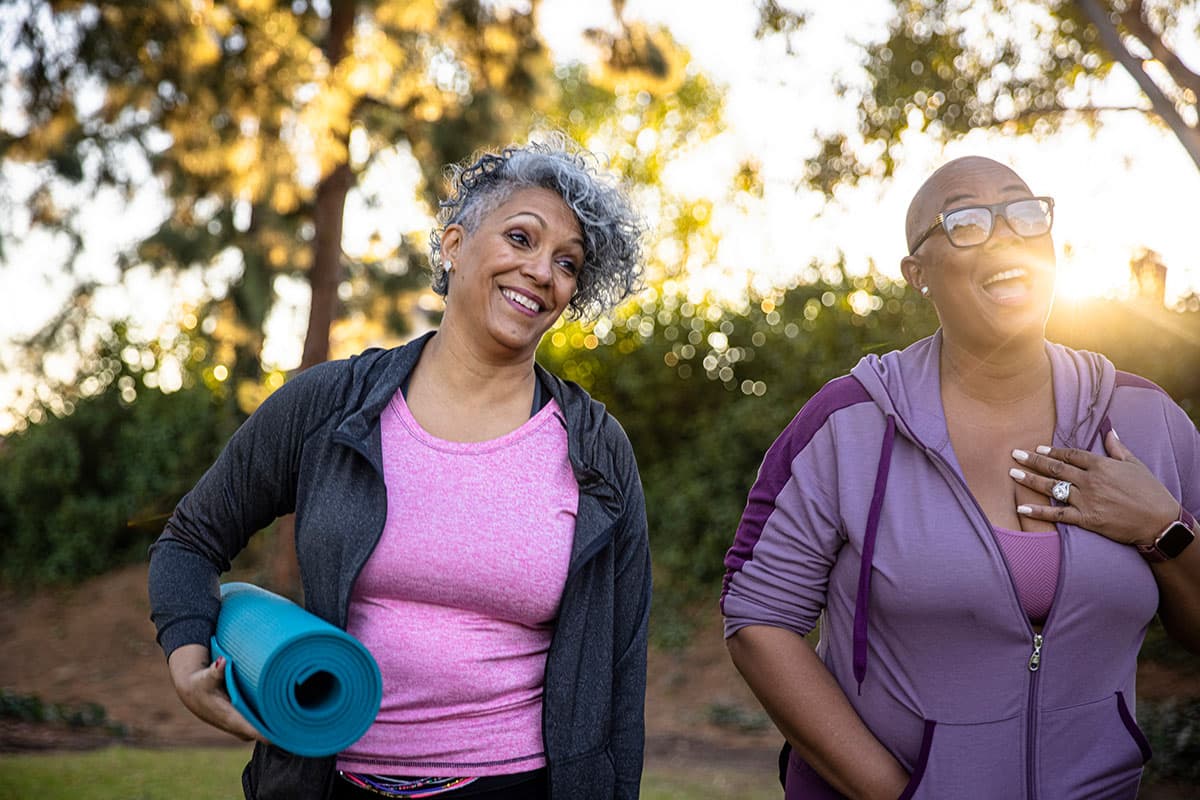 two woman doing yoga outdoors after hiatal hernia surgery in Marion & Mount Vernon